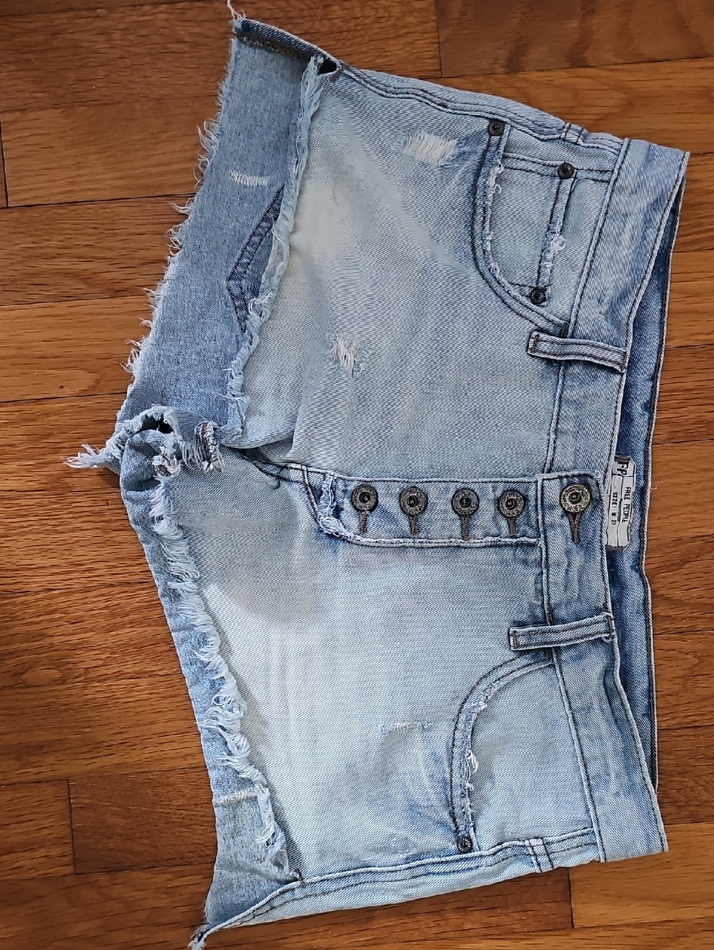 Free People Light Wash Distressed Denim Shorts